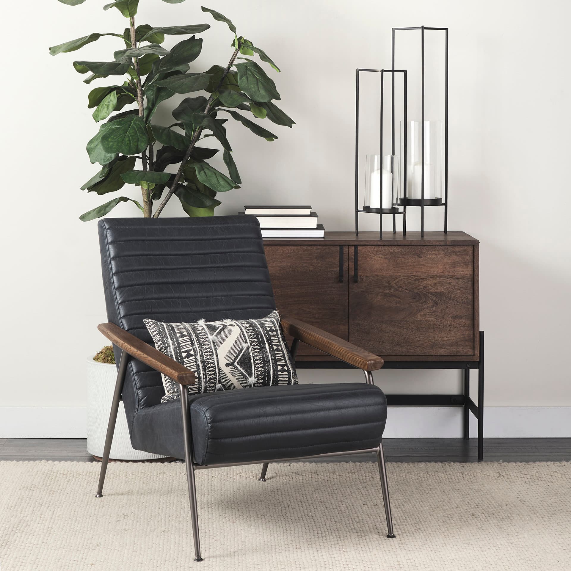 Abigail I Large Gunmetal Gray Metal Table Candle Holder — in a styled room