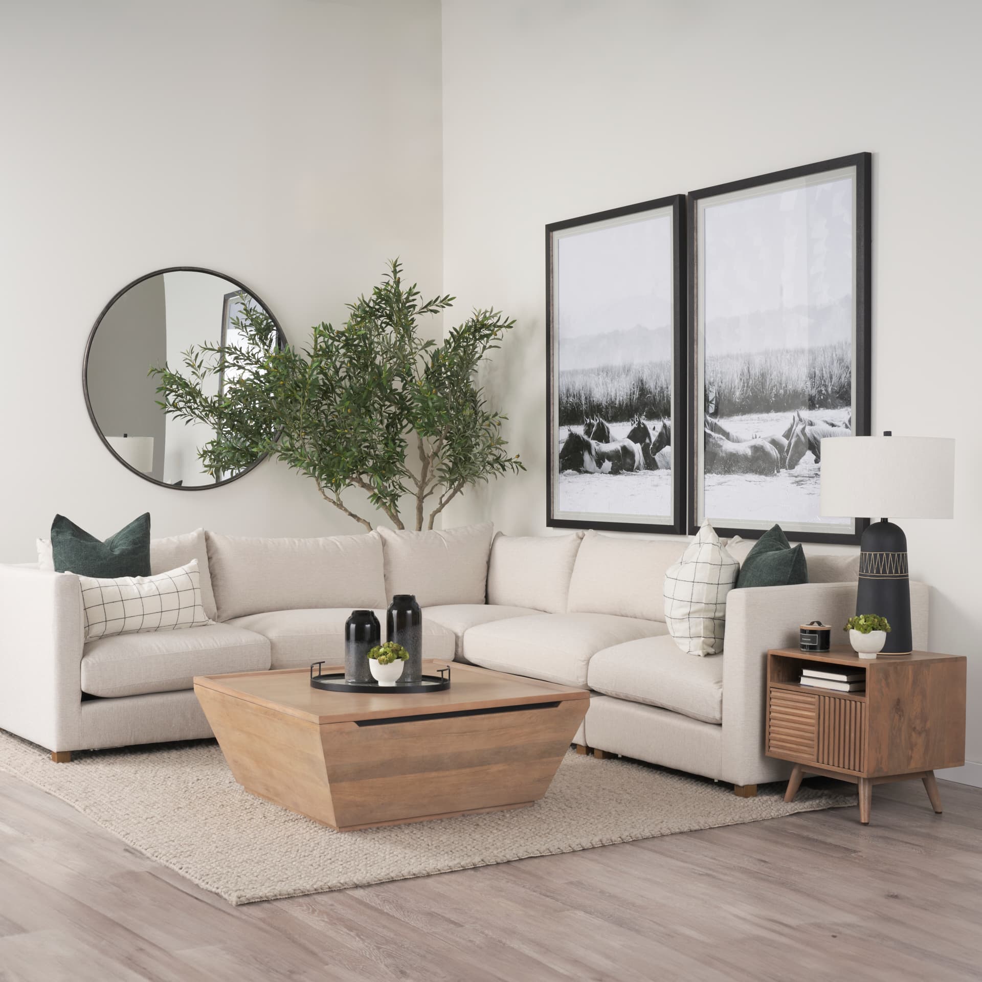 Wyatt 41.0L x 41.0W x 16.0H Brown Wood Angular Coffee Table — in a styled room