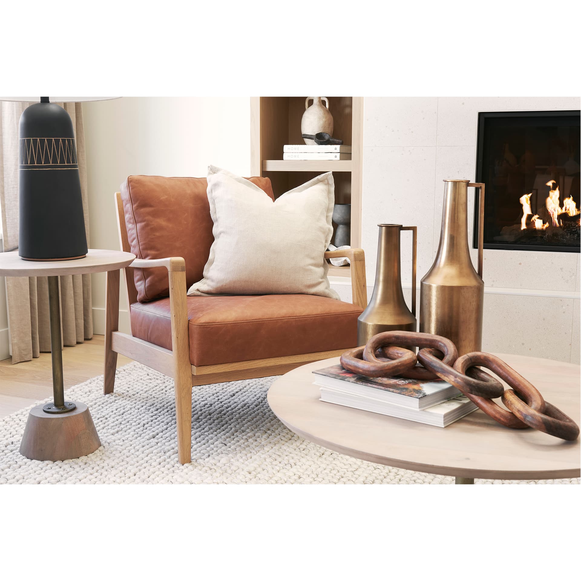 Raeleigh Tan Faux Leather Accent Chair — in a styled room