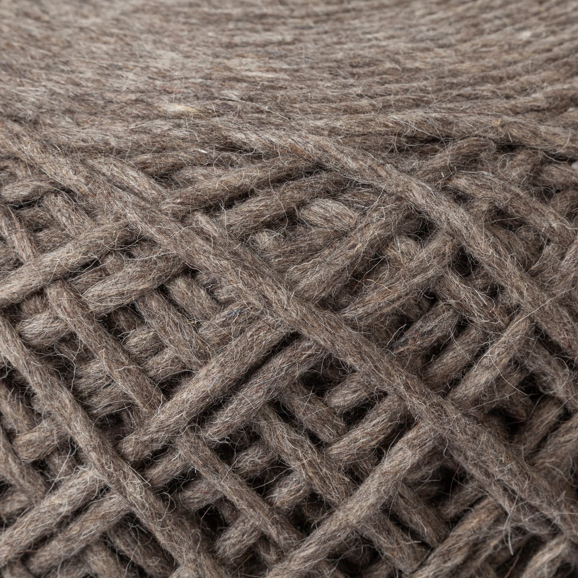 Allium Dark Brown Handwoven Wool Cylindrical Pouf — product photograph