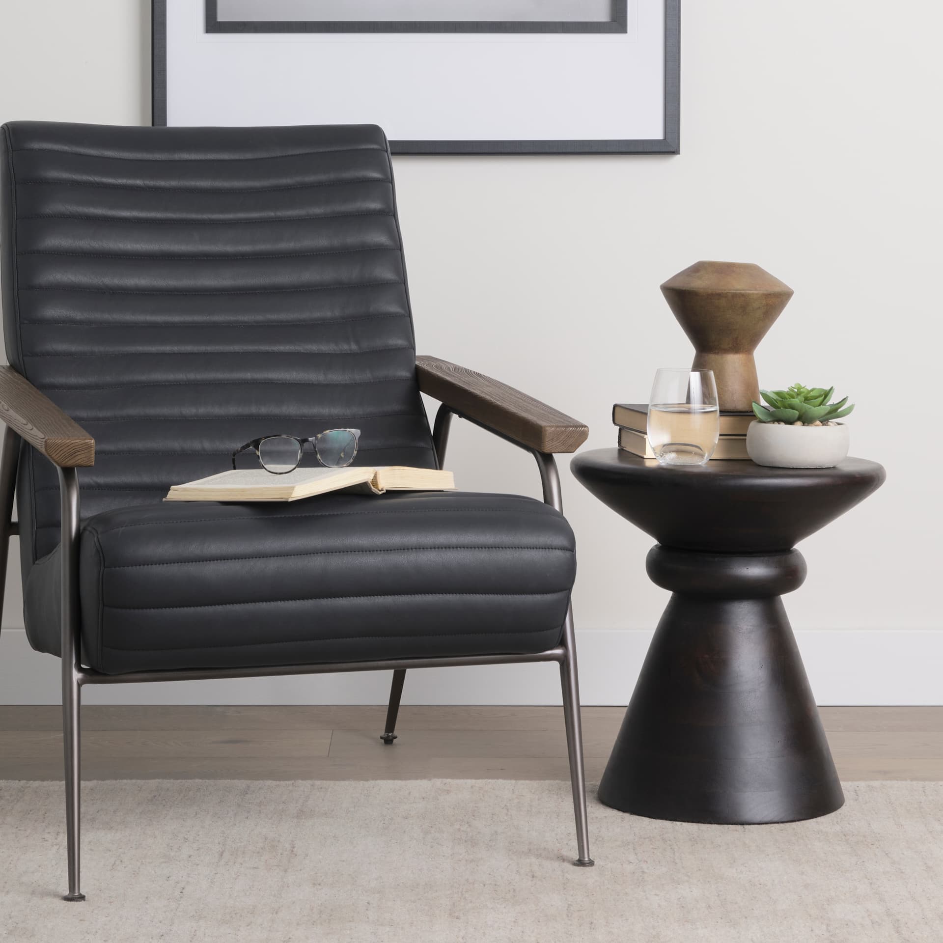 Palmera Dark Brown Wood Pedestal Accent Table — in a styled room