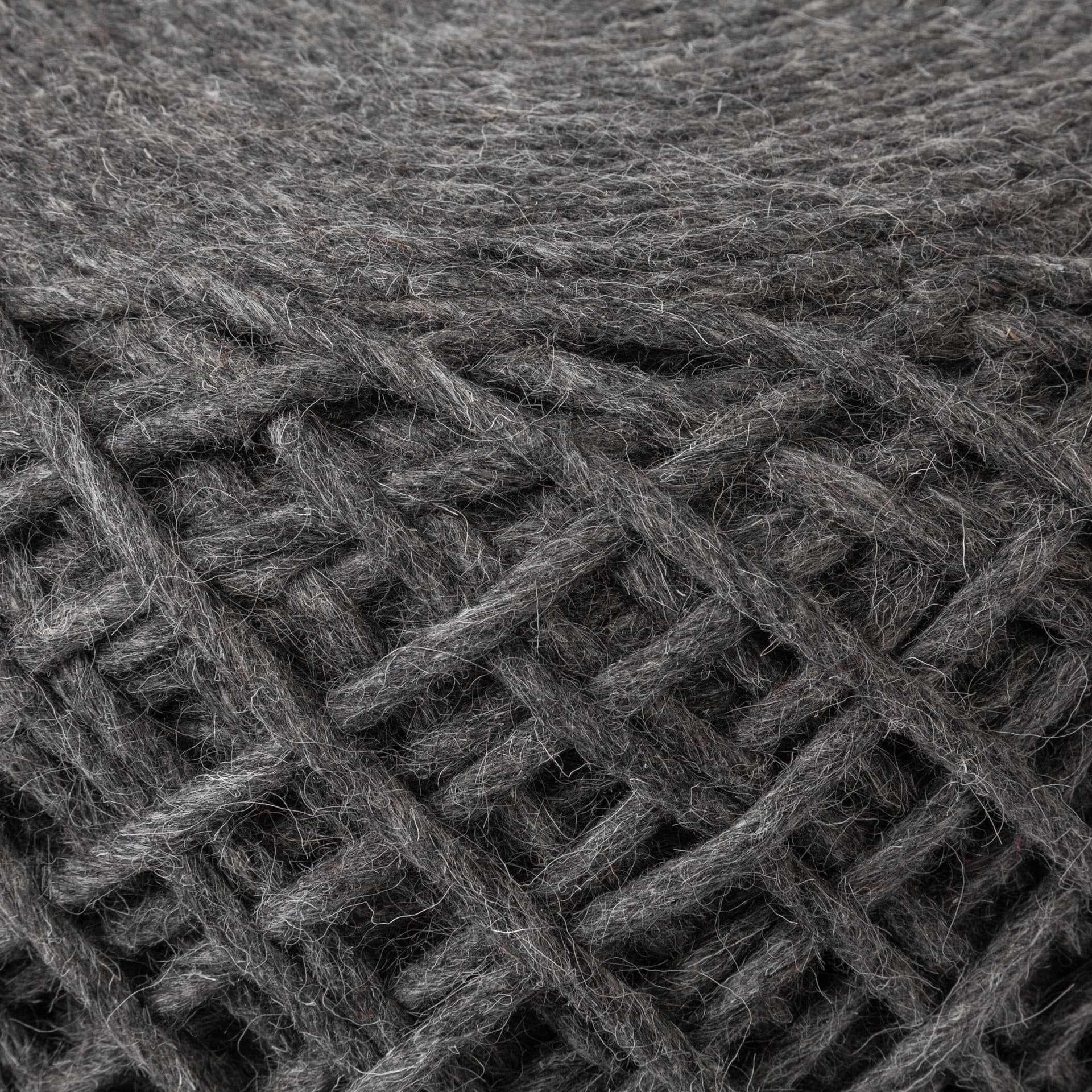Allium Dark Gray Handwoven Wool Cylindrical Pouf — product photograph
