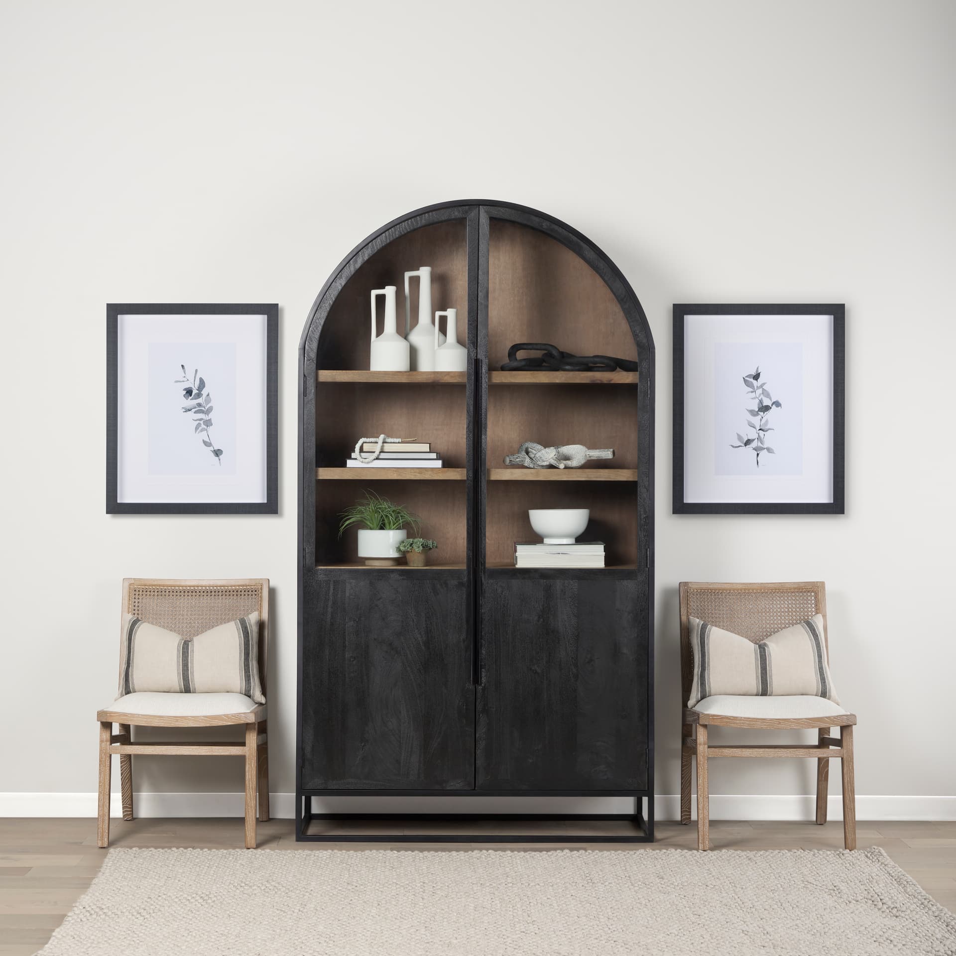 Sloan 47.5W x 85.5H Black Wood W/Black Metal Frame Arch Cabinet — in a styled room