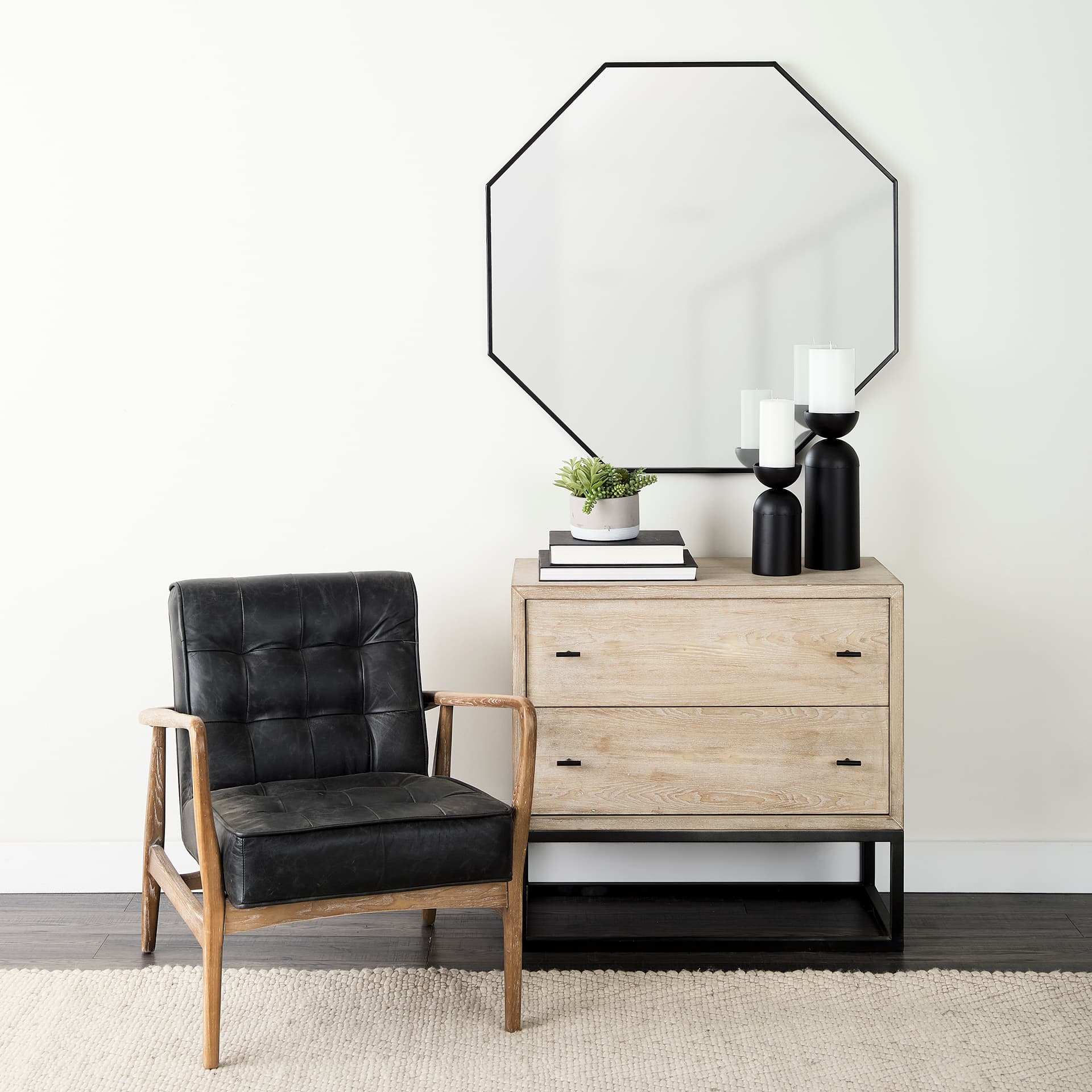 Helix 37" Octogon Black Metal Frame Mirror — in a styled room