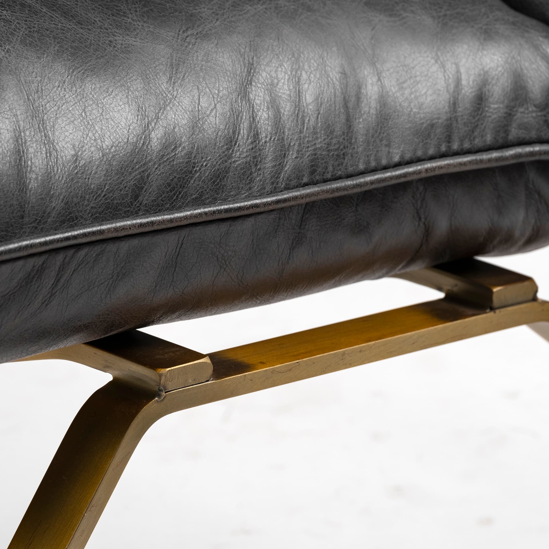 Flavelle II Black Leather Cushion Seat and Solid Iron Base Accent Chair — product photograph
