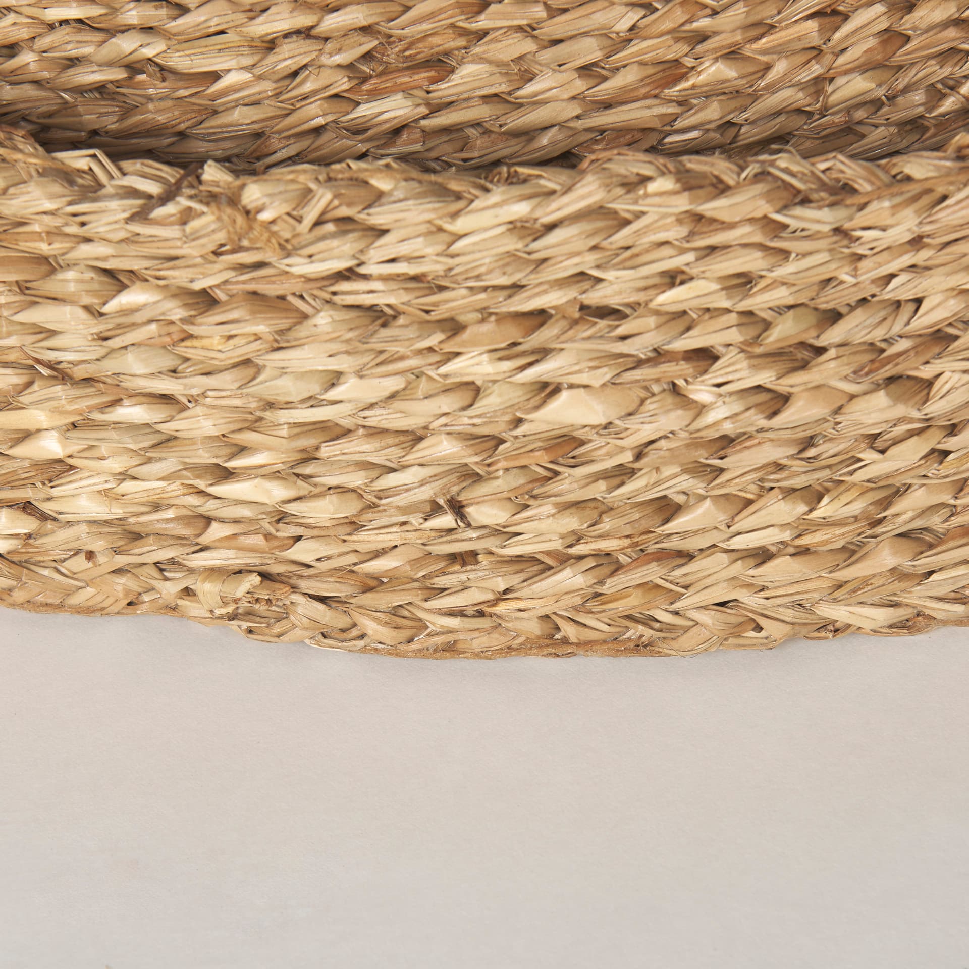 Ulana Set of 3 Round Nesting Seagrass Trays w/ Loop Handles — product photograph
