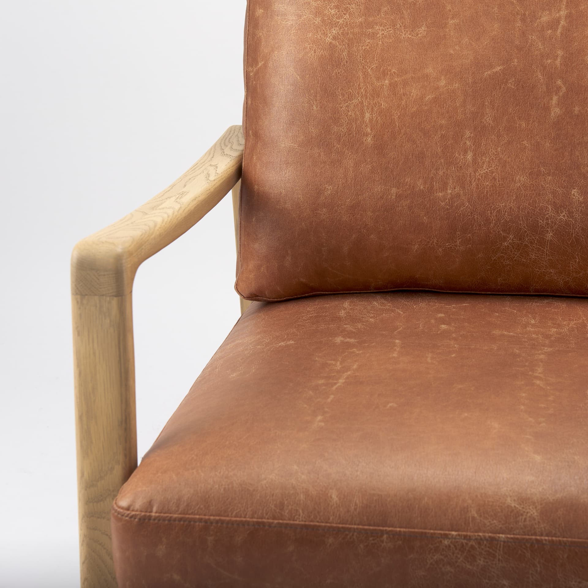 Raeleigh Tan Faux Leather Accent Chair — product photograph