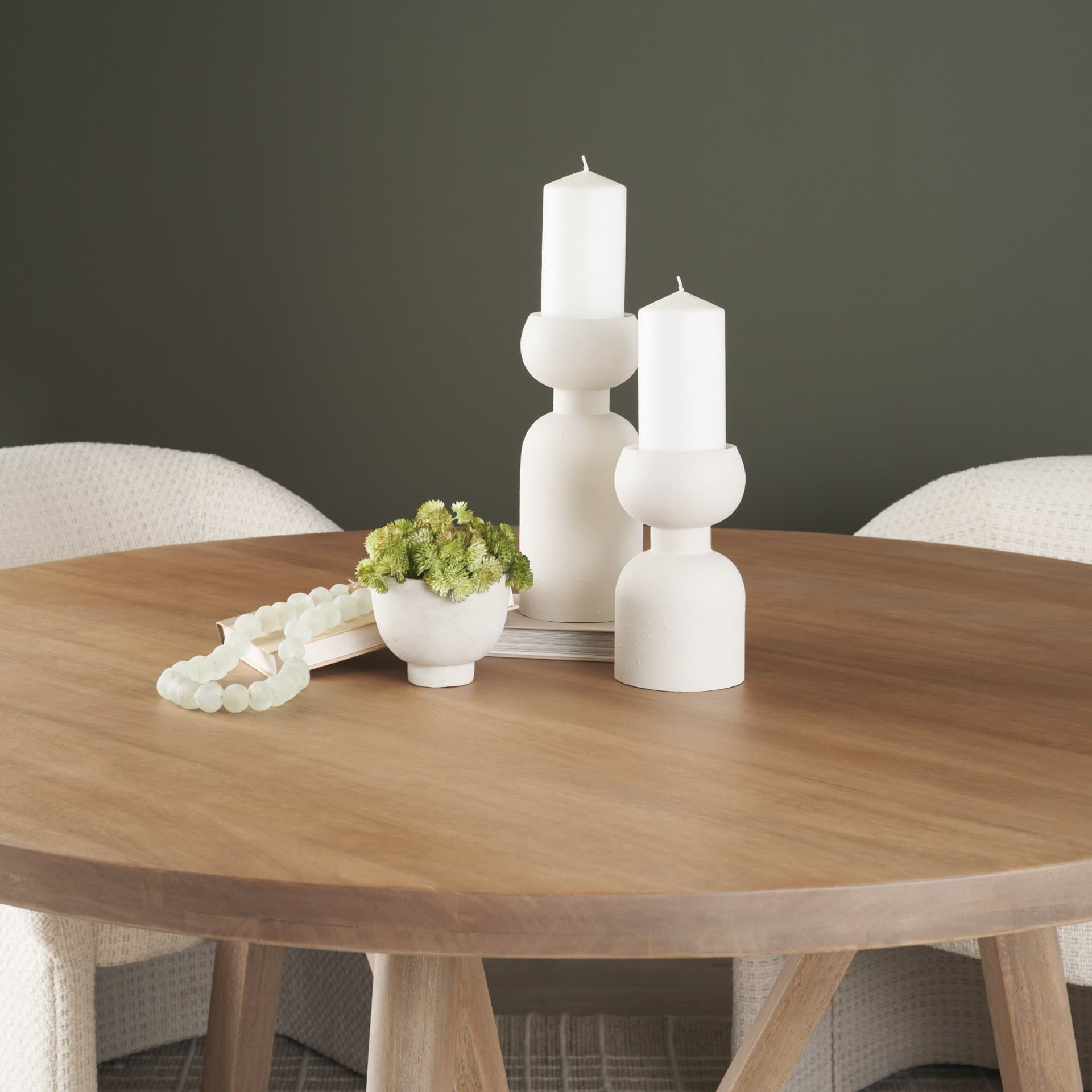 Pelar Small Matte White Metal Stacked Pillar Candle Holder — in a styled room
