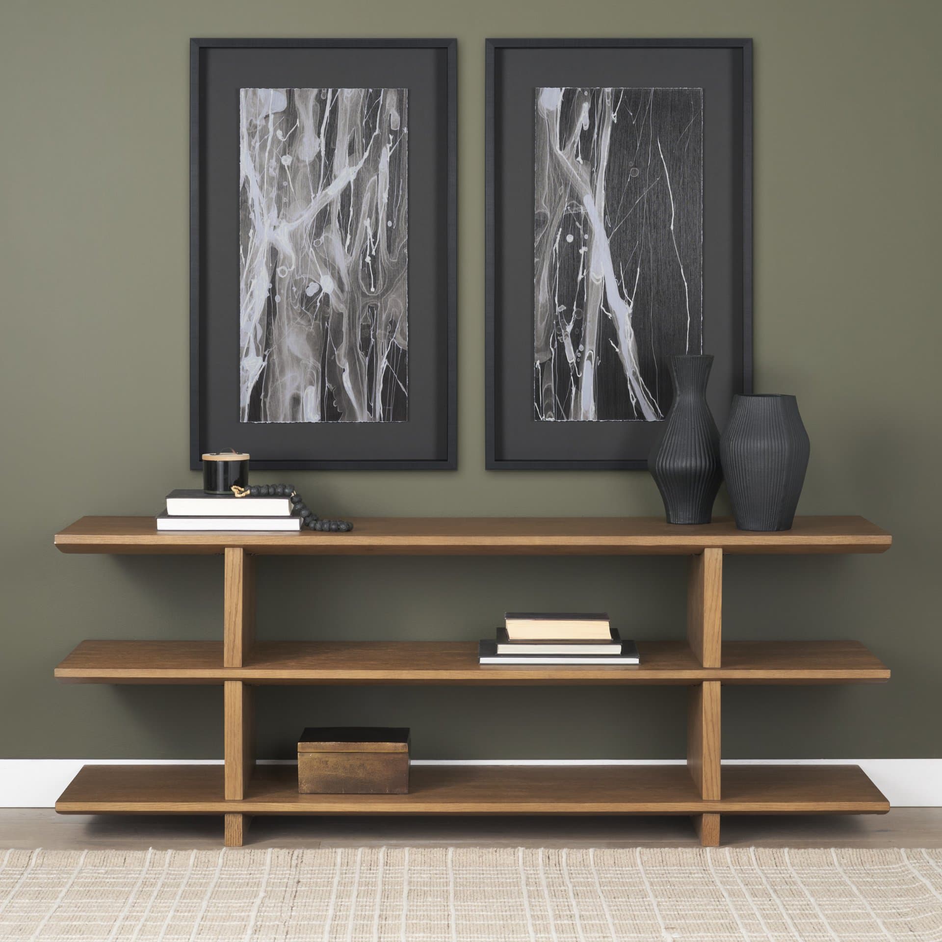 Boden 74" Wood Console Table w/ Open Shelves — in a styled room