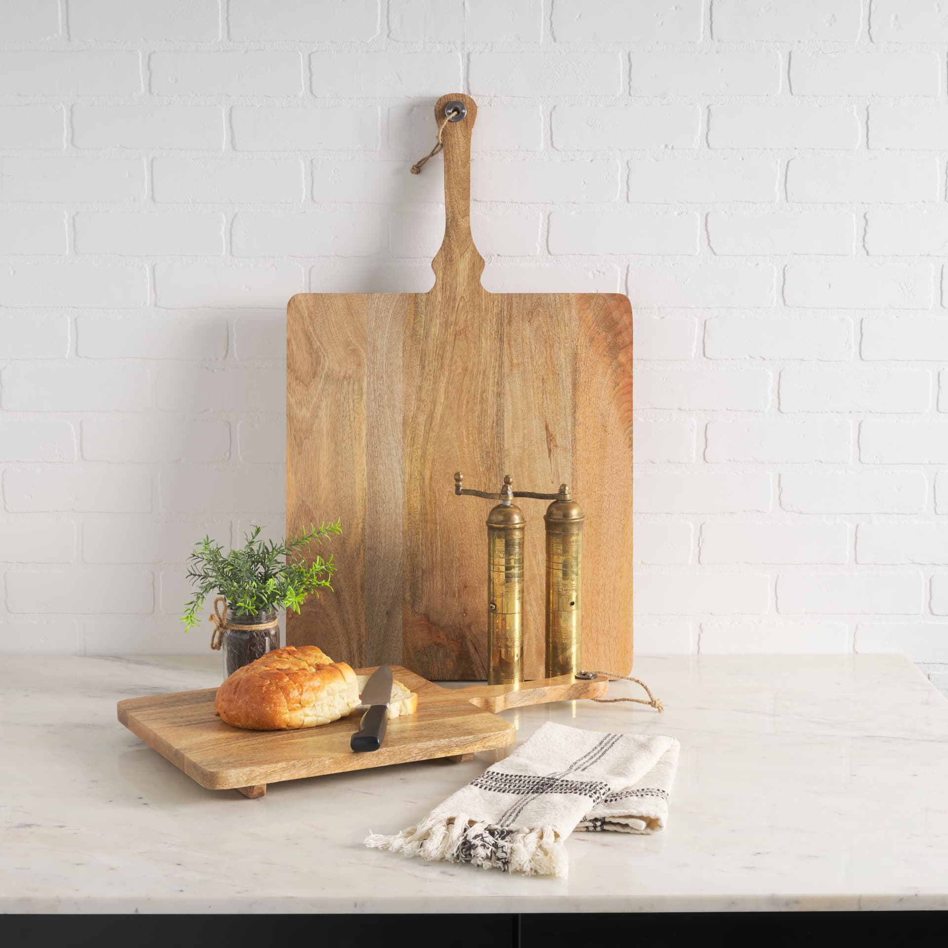 Khana Natural Solid Wood Square Serving Boards — in a styled room