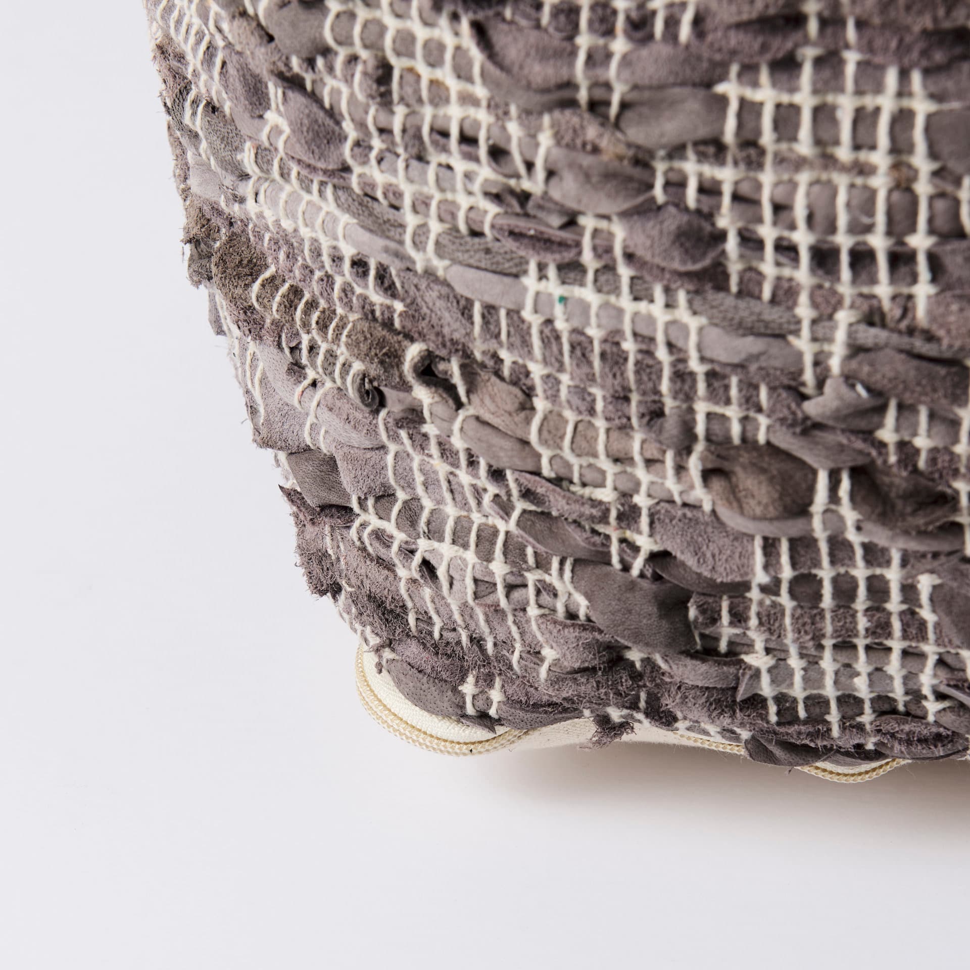 Falguni 16.0L x 16.0W x 16.0H Gray Leather and Cotton Patterned Pouf — product photograph
