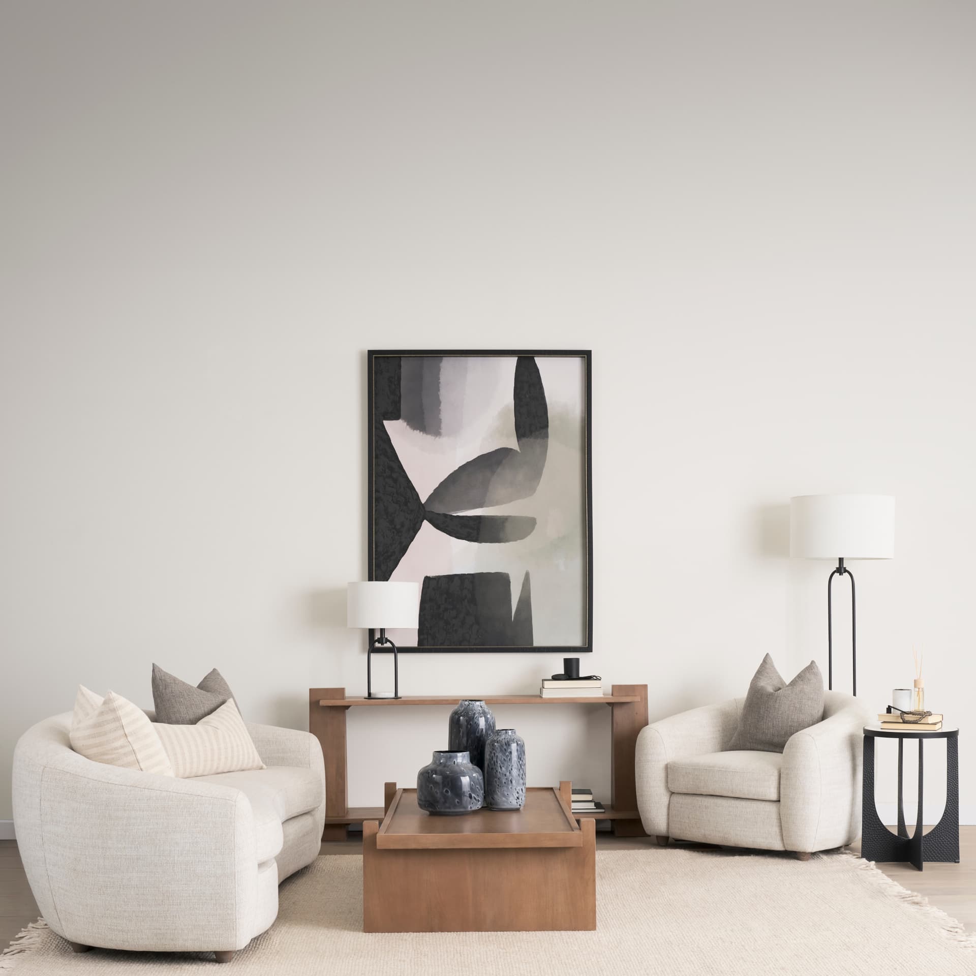 Sarah 15.0L x 10.0W x 22.2H Arched Black Metal W/Marble Cube and White Shade Table Lamp — in a styled room