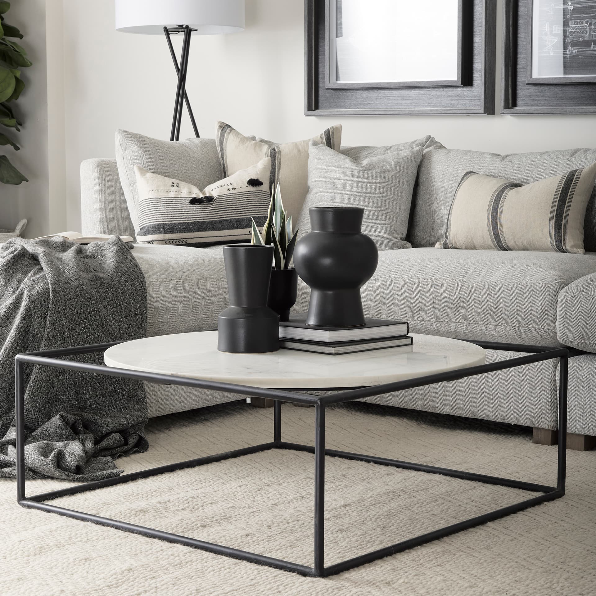 Austen 36L x 36W x 14.5H Round White Marble Top W/ Black Metal Frame Coffee Table — product photograph