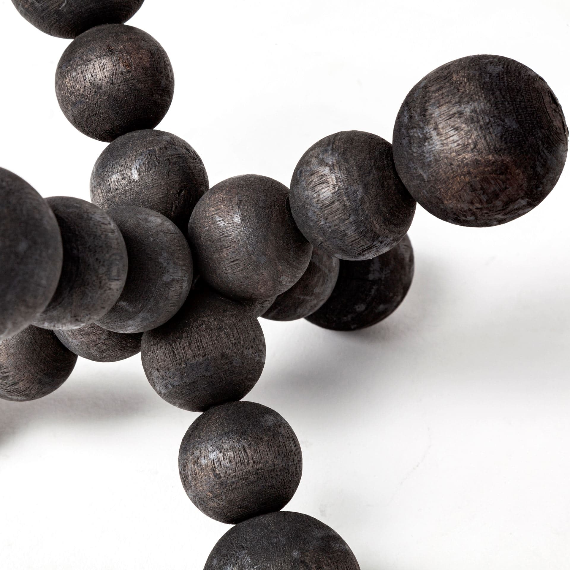 Carollan I (Small) 7L x 7W Black Geometric Wood Ball Jack — product photograph