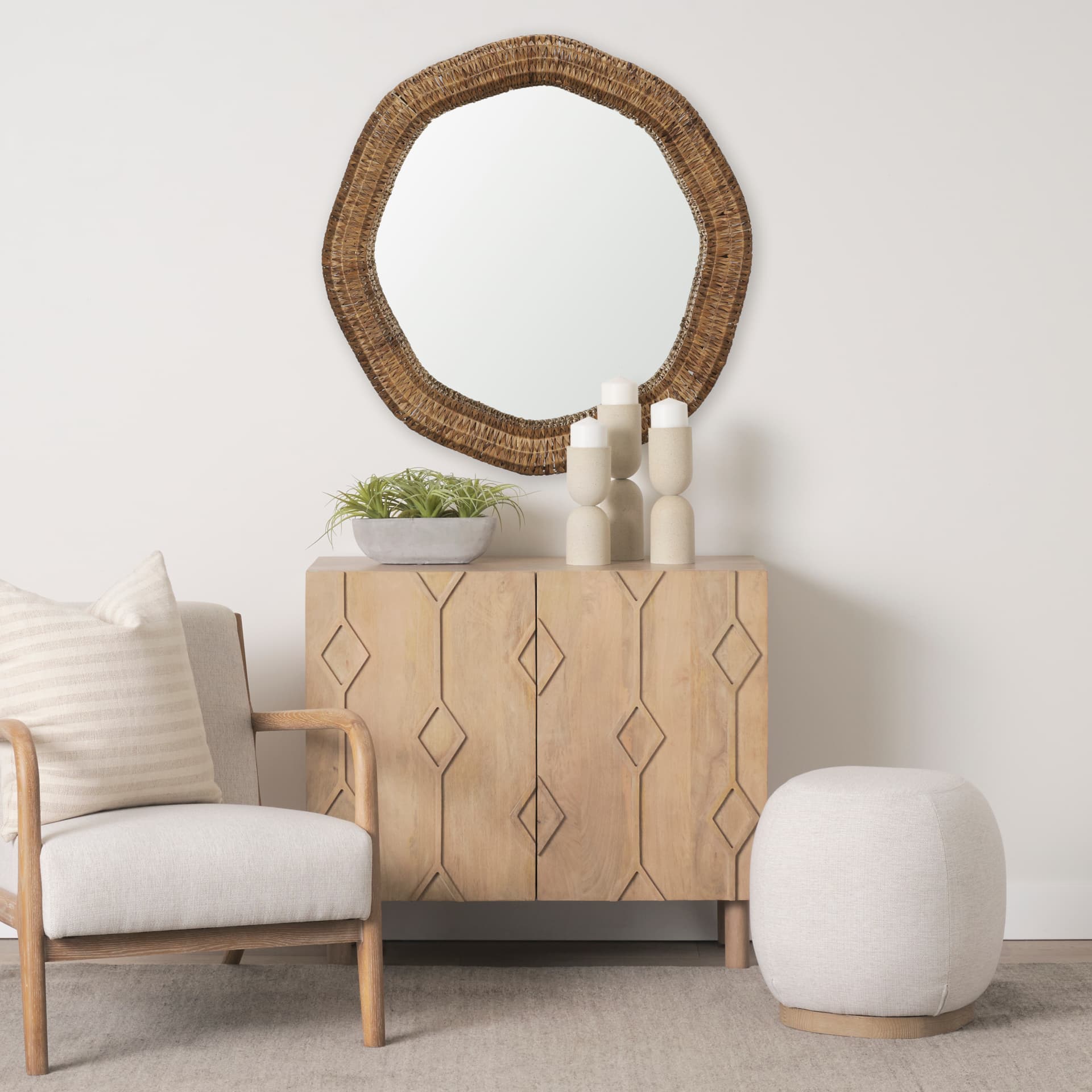 Warrick 36" Woven Water Hyacinth Mirror — in a styled room