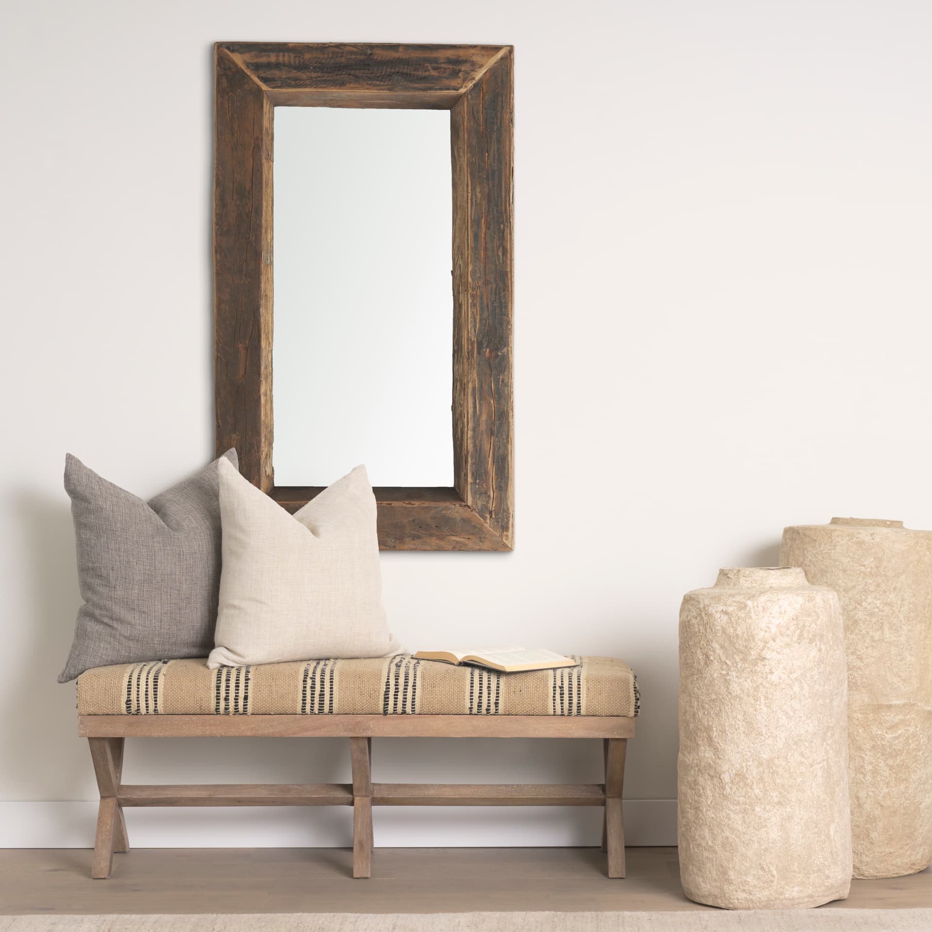 Gerome 28 x 48 Brown Wood Frame Rectangular Wall Mirror — in a styled room