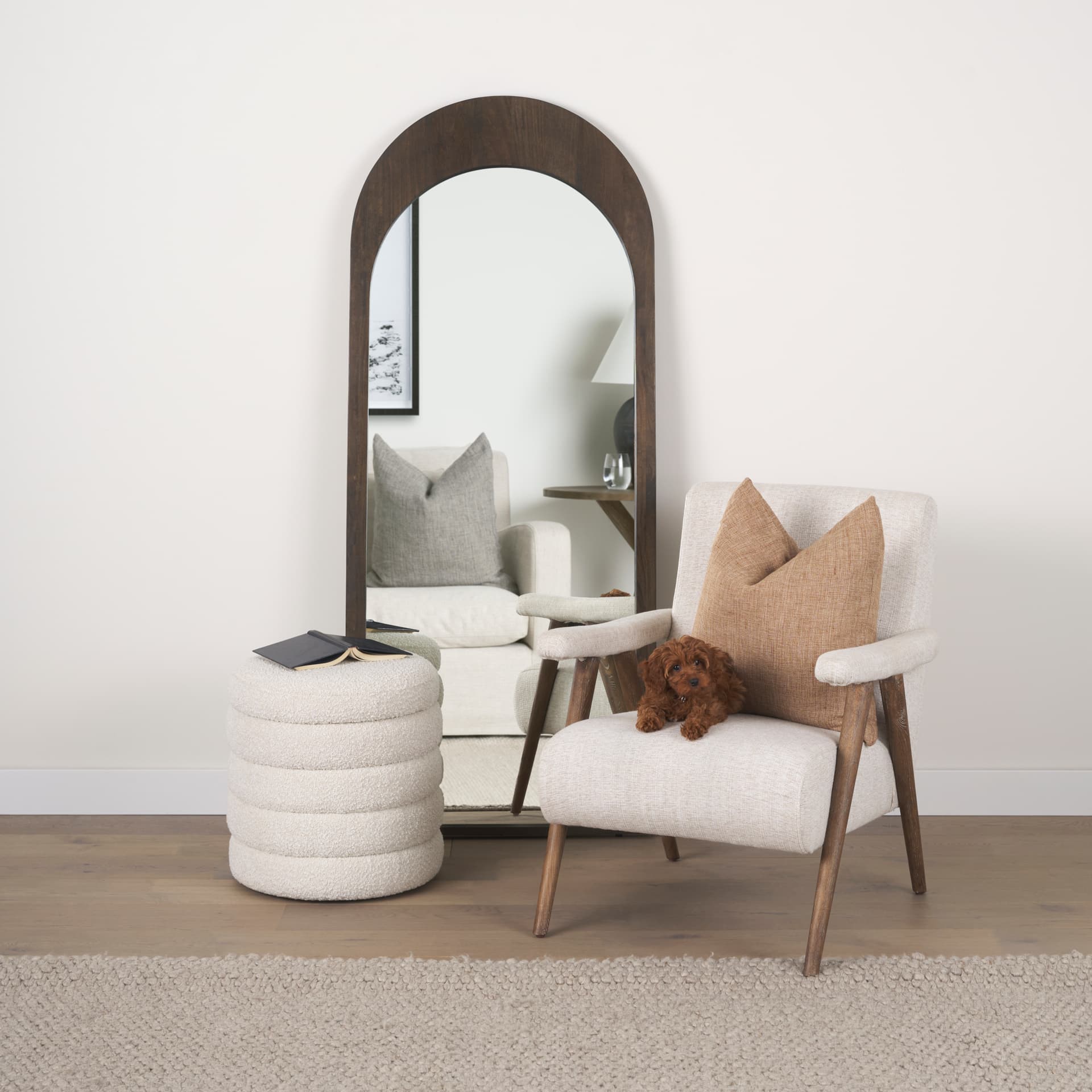 Celeste Dark Brown Wood Arched Floor Mirror — in a styled room