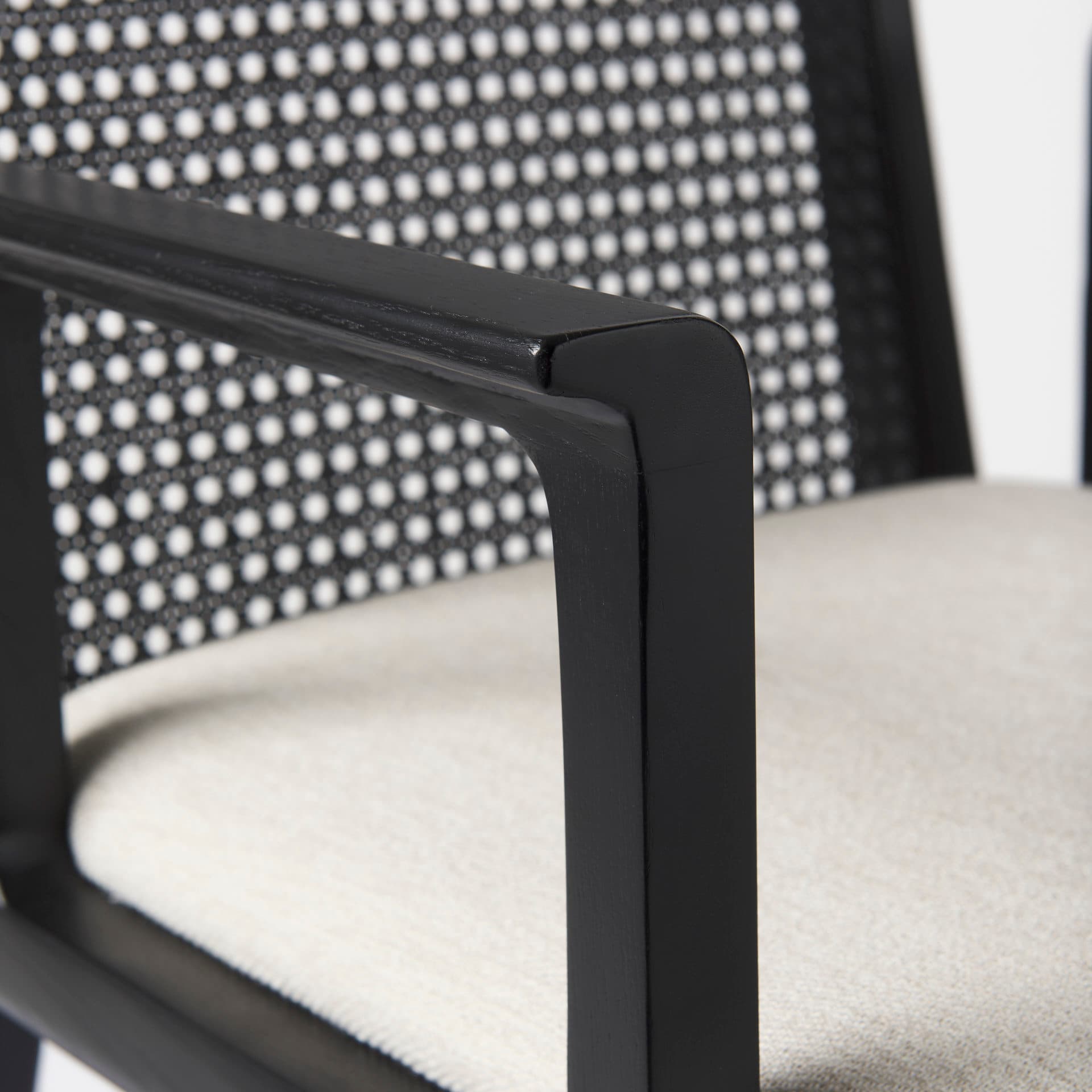 Clara Cane Back Dining Arm Chair | Cream Fabric w/ Black Wood — product photograph