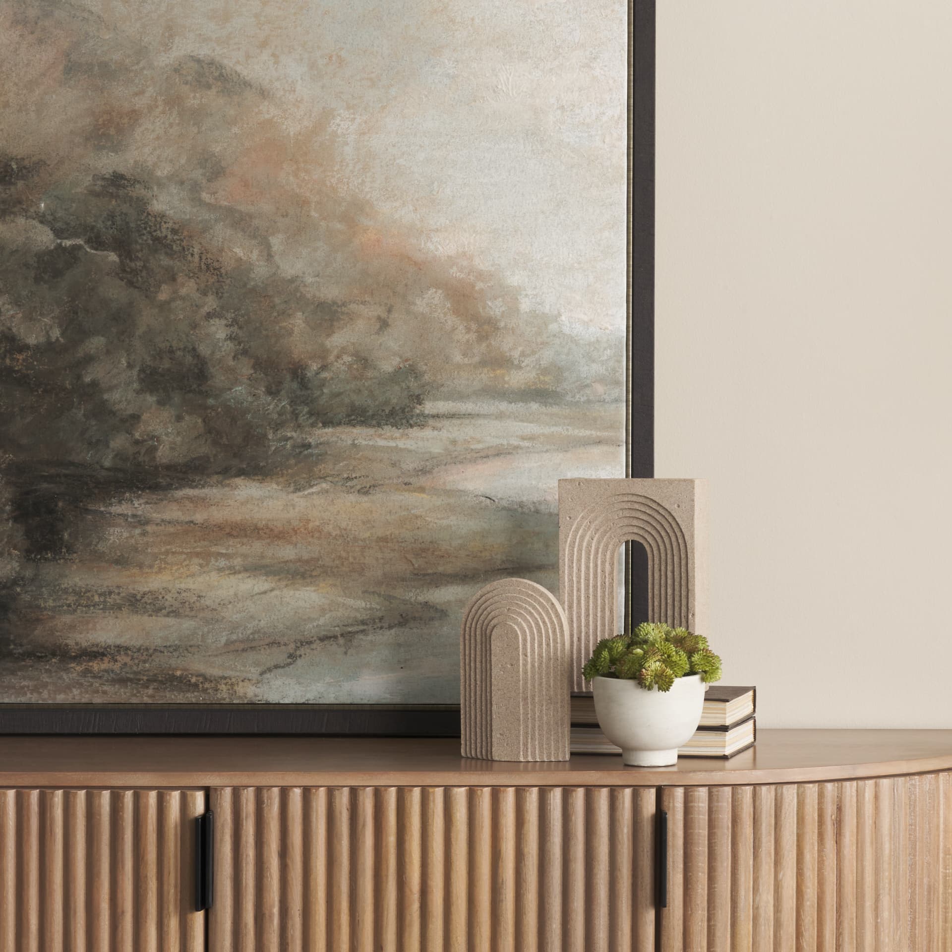 Kacia Resin Textured SandStone Decorative Object — in a styled room