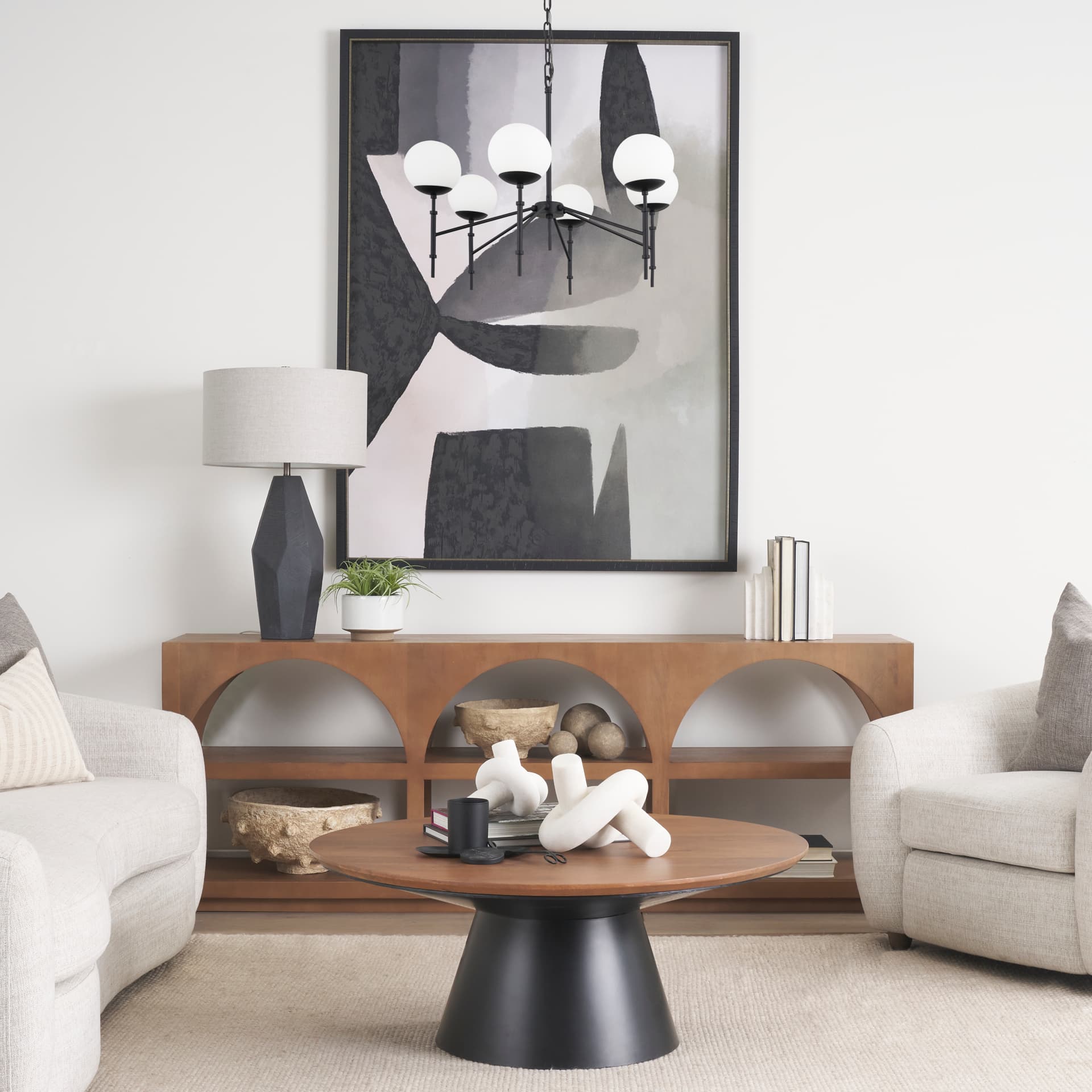 Edie Matte Black Metal w/ Frosted Glass Globes 6-Light Chandelier — in a styled room