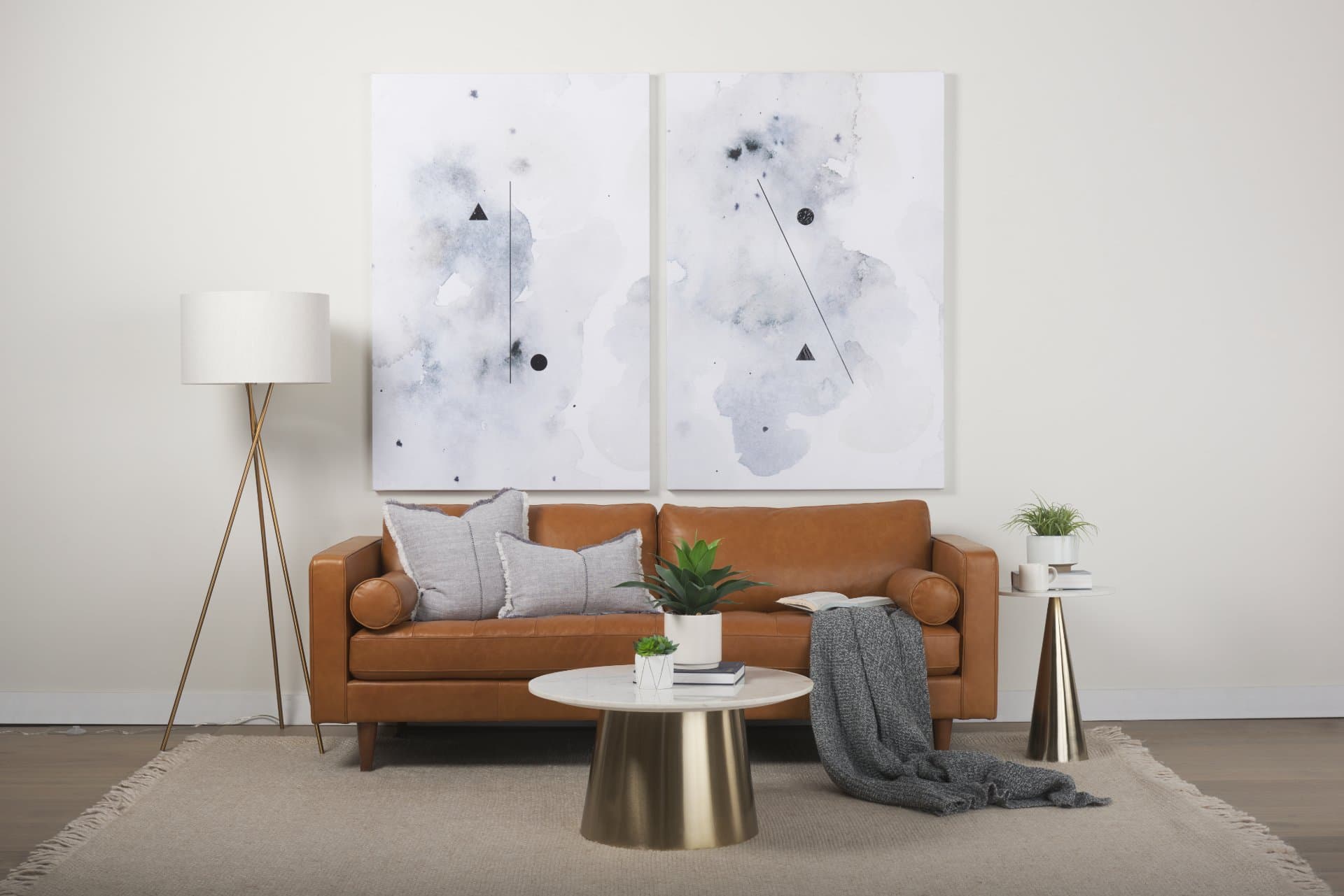 Svend 88.0L x 38.0W x 34.0H Tan Leather Sofa — in a styled room