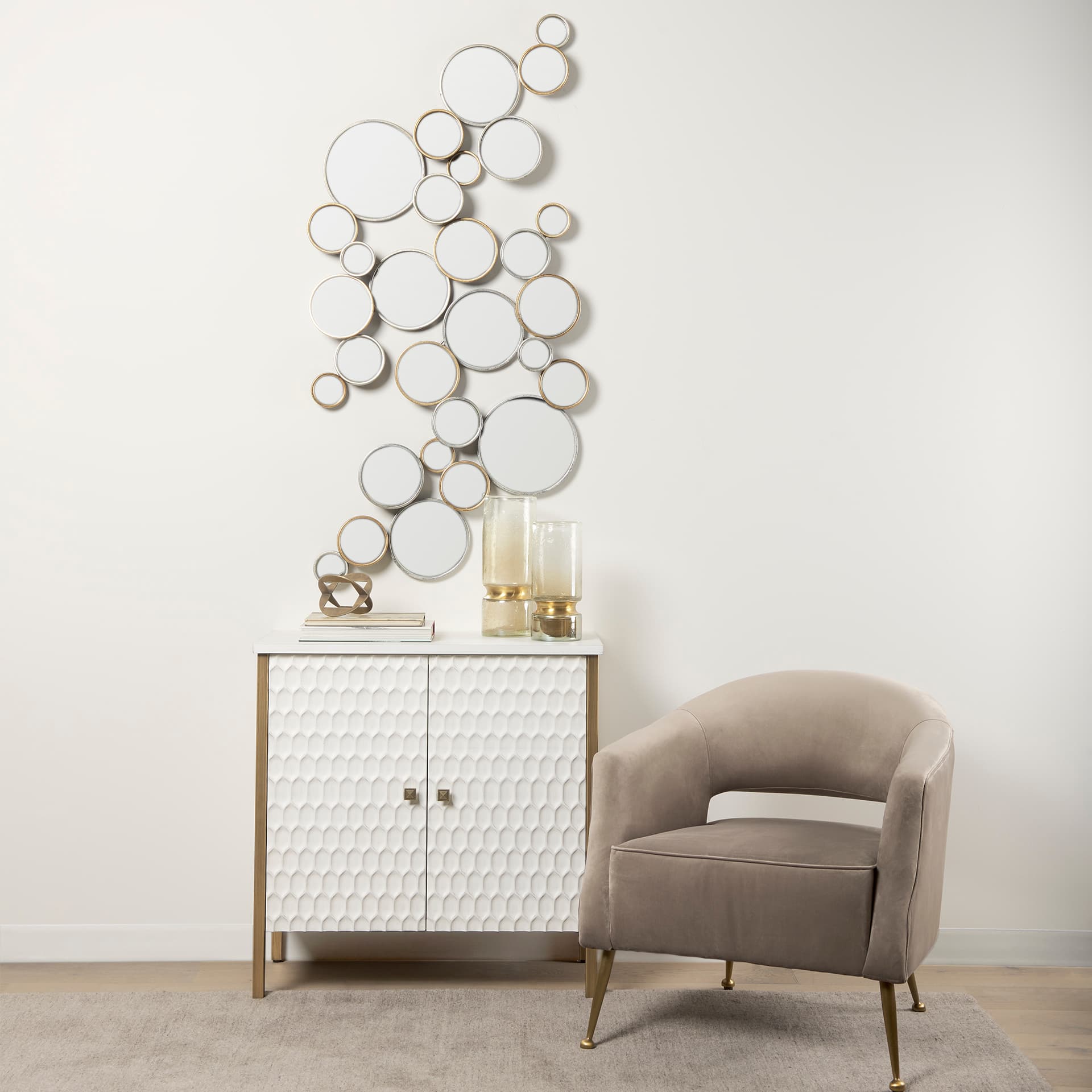 Adriatic I Small Brushed Gold Metal Glass Vase — in a styled room