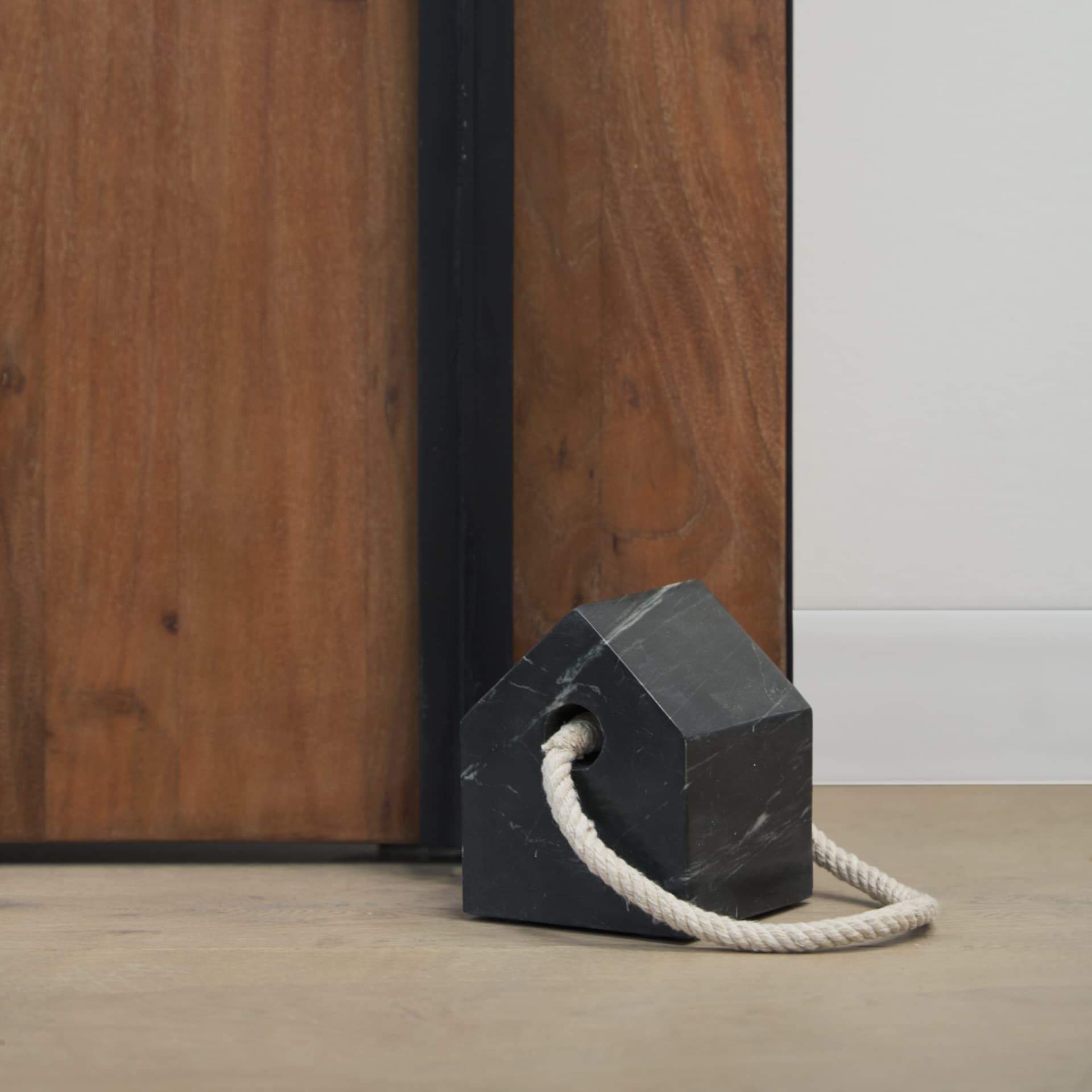 Raena Black Marble House Door Stopper — product photograph
